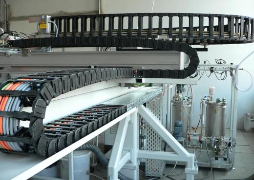 The apron conveyor is a type of conveyor system that may be used to move materials.