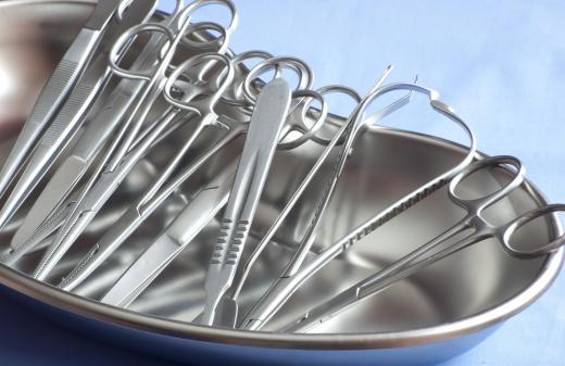 Surgical steel instruments are sterilized at high temperatures inside an autoclave.