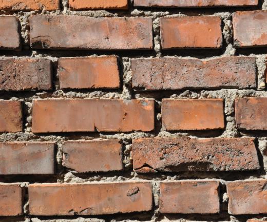 Portland cement may be used as a binder between brick.