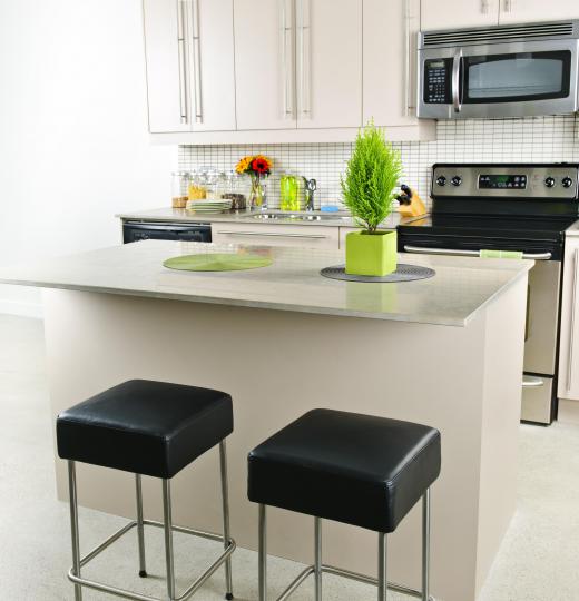 Sealed concrete resists corrosion and chemicals, which makes it ideal for kitchens.