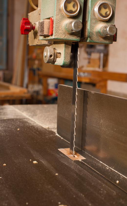 Bandsaws are most commonly used to make straight cuts in wood, but can also be used on metal.