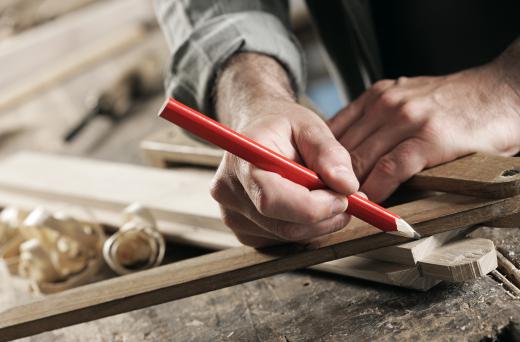 Carpenters often carry portable workbenches to provide themselves with a work space and a place to organize their tools.