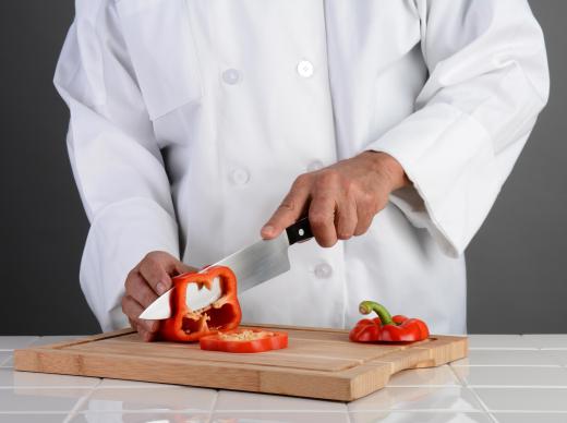 Chef using a hollow ground blade.