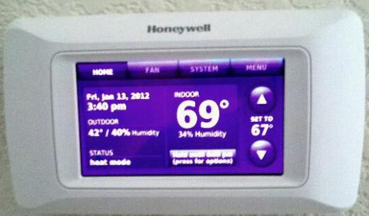 A thermostat connected to an industrial air conditioning system.