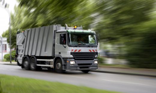 Trash is transported to a landfill, where it may be compacted.