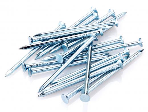 Most types of nails can be removed using a bar nail puller.