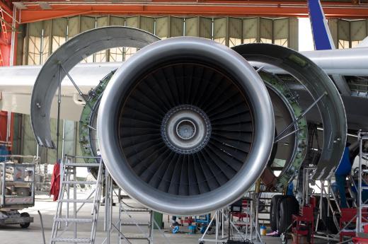 The high-pressure compressor shaft on a turbofan engine is located directly behind its intake fans.