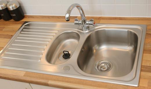 Items made of stainless steel, such as kitchen sinks, are often made from steel alloys that include manganese.