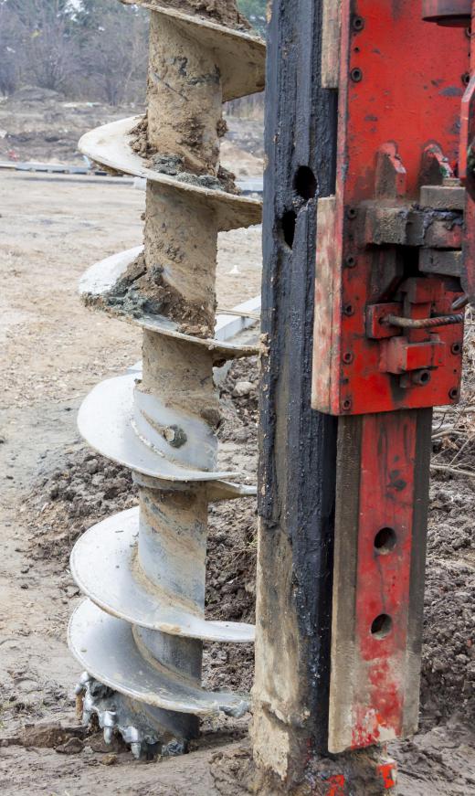 Augers may be used for boring into the ground to create holes for fence posts.