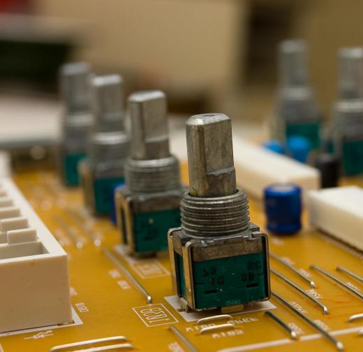 Variable resistors are attached to a battery and moving meter in an ohmmeter.