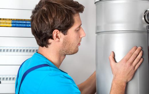 Some central heating systems use an electric boiler to heat water or air that is then used for warming a home or building.