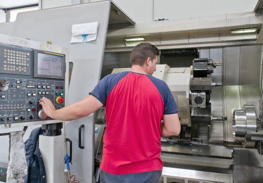 Angle plates hold the materials being machined in a CNC router.