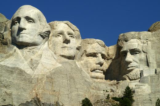 Mount Rushmore is cleaned and restored using industrial rope access.