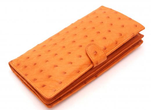 Leather manufacturers prepare animal hides to be made into consumer goods, such as wallets.