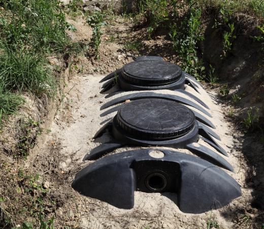 An abandoned well can serve as an accumulation site for pollutants, which includes materials leached from septic tanks.