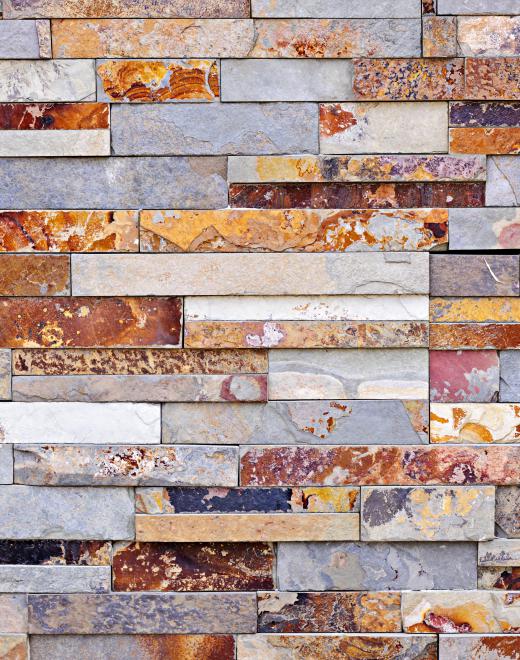 Some manufacturers produce cladding panels from thin sheets of stone veneer.