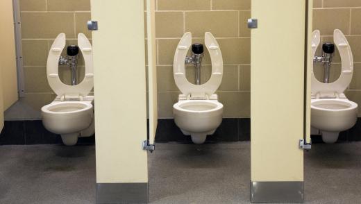 A commercial toilet is used in public restrooms.