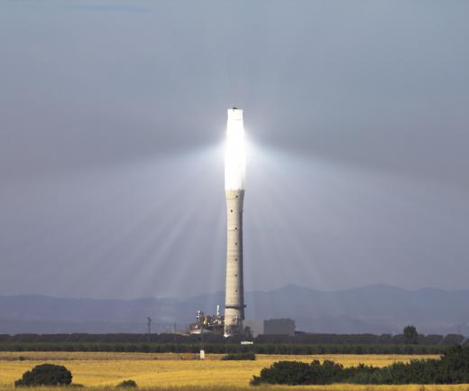 A solar thermal plant uses solar panels to absorb sun, then lenses and mirrors to concentrate the heat to activate a steam generator.