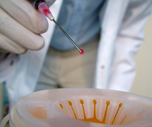 Used needles and similar items are stored and transported in special puncture-proof sharps containers.